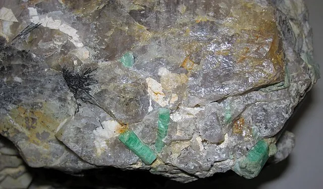 emerald in granite and pegmatite